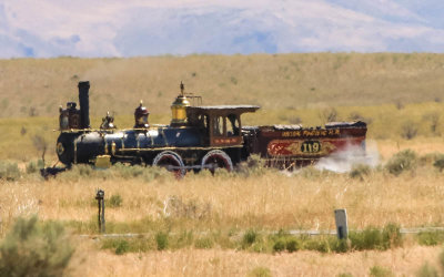 Union Pacific Railroad (UPRR) Engine 119 approaches Promontory Summit from the east in Golden Spike NHP