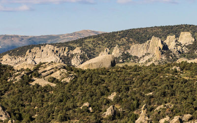 Distant granite formations as seen from the Circle Creek Basin in City of Rocks National Reserve