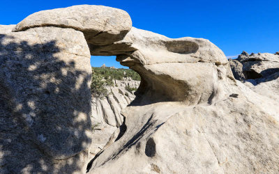 Window Arch frames granite formations in City of Rocks National Reserve