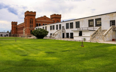 View across the yard of the Cell House and Administration buildings in the Old Montana Prison