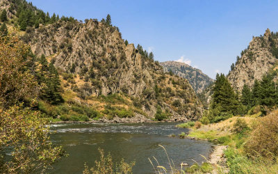 Wide view of the Madison River flowing through Bear Trap Canyon