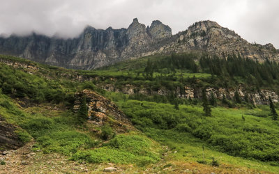 Clouds envelop the west side of the Garden Wall in Glacier National Park