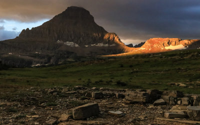 Sunlight brightens the landscape near Reynolds Mountain at Logan Pass in Glacier National Park