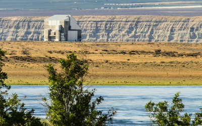 Cocooned F Reactor with the White Cliffs of the Columbia River in the background in the Hanford Reach Unit MPNHP