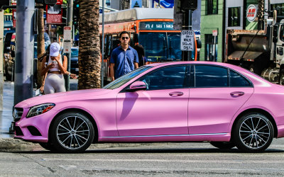 Pink Mercedes Benz crossing Hollywood Boulevard in Hollywood