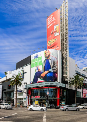 Advertisements on Hollywood Boulevard and Highland Avenue in Hollywood