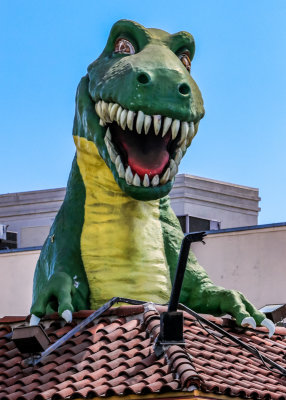 Tyrannosaurus Rex above a store on Hollywood Boulevard in Hollywood