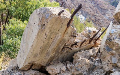 Remnants of St. Francis dam concrete laced with torn rebar in St. Francis Dam Disaster National Monument