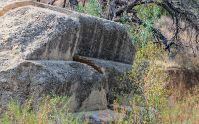 Closeup of the cracked stair-stepped face of the St. Francis Dam in St. Francis Dam Disaster National Monument