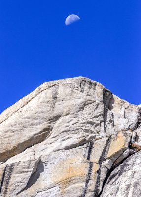 The moon over a granite ridge in Yosemite National Park