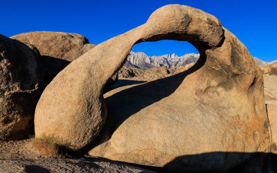 Wide view of Mobius Arch framing the Sierra Nevada range in the Alabama Hills National Scenic Area