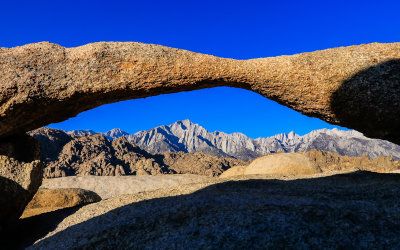 Lathe Arch frames Lone Pine Peak (left center) and Mount Whitney (right) in the Alabama Hills National Scenic Area