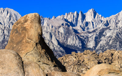 Rock formation flanks a view of Mount Whitney (right) in the Alabama Hills National Scenic Area