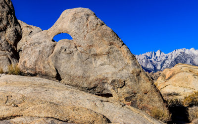 Mount Whitney flanks Sharkstooth Arch in the Alabama Hills National Scenic Area