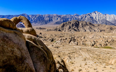 The Sierra Mountain Range and the Eye of Alabama Hills Arch in the Alabama Hills National Scenic Area