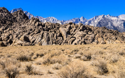 The Sierra Mountain Range over a rock jumble in the Alabama Hills National Scenic Area