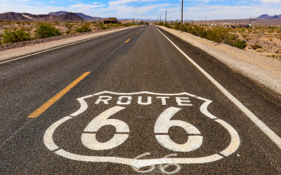 US Route 66 emblem painted on the Mother Road near Ludlow California along US Route 66