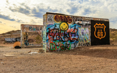 Abandoned buildings covered in graffiti along US Route 66