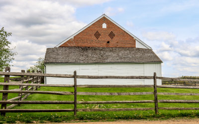 Hole in the Abraham Trostle barn created by a Confederate artillery round in Gettysburg NMP