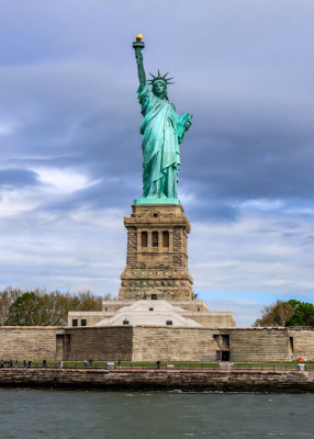 Straight on view of the Statue of Liberty in New York Harbor in Statue of Liberty NM