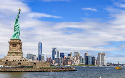 New York City skyline with the Statue of Liberty in the foreground in Statue of Liberty NM