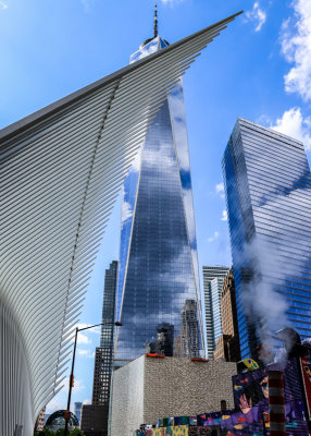 Oculus wing highlights One World Trade Center in the 9/11 Memorial Grounds