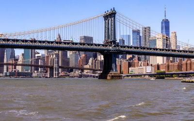 Manhattan and Brooklyn Bridges frame lower Manhattan from the NYC Boat Tour