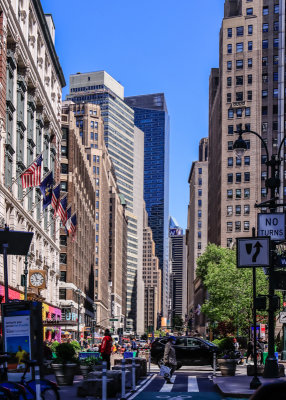 Maceys building (left) is among the tall building lining the street in New York City