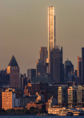 Setting sun reflecting off of a midtown Manhattan building
