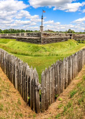 Spike wall at the Southwest bastion with flag stand in Fort Stanwix NM