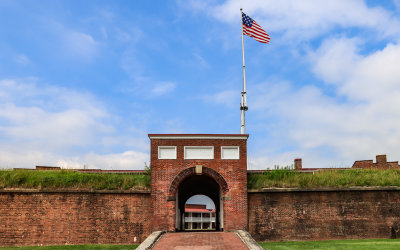 Fifteen-star flag flies over the Sally Port entrance in Fort McHenry NM and HS
