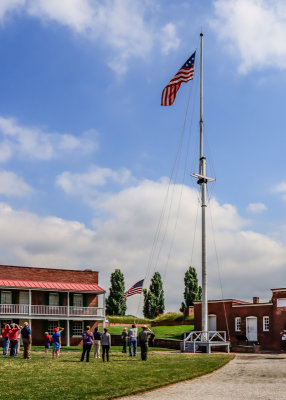 Larger flag is installed after the morning flag change in Fort McHenry NM and HS