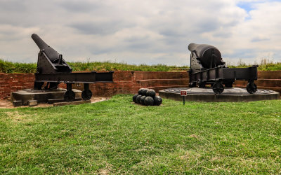 Closeup of cannons mounted on the wall in Fort McHenry NM and HS
