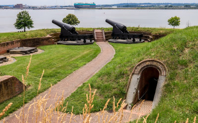 Cannons mounted on a bastion and magazine entryway in Fort McHenry NM and HS