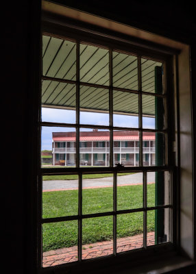 Enlisted Mens Barracks as seen through a guardhouse window in Fort McHenry NM and HS
