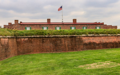Fifteen-star flag flies over barracks in Fort McHenry NM and HS