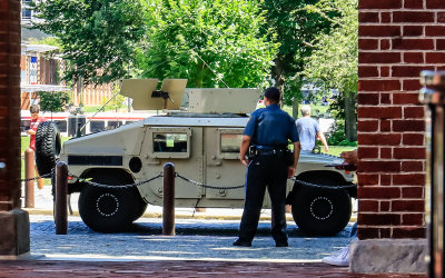 Military vehicle passes by Independence Hall in Philadelphia