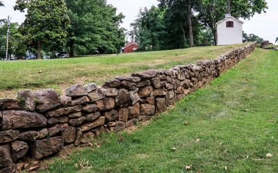 Original Sunken Road wall and the Innis House at Fredericksburg in Fredericksburg - Spotsylvania Co NMP