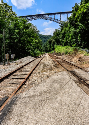 The New River Gorge Bridge from the railroad crossing on the Fayette Station Road in New River Gorge National Park