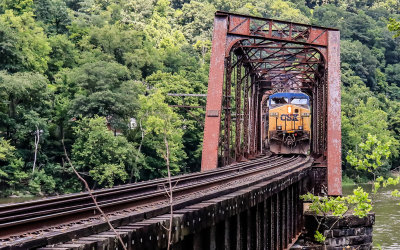 Train coming through the railroad bridge near the town of Prince in New River Gorge National Park