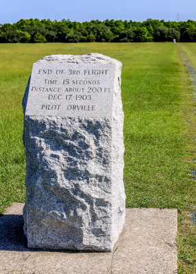 Third flight Marker, with fourth flight marker in the distance, in Wright Brothers National Memorial