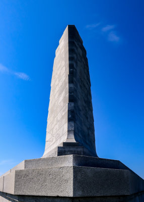 Dramatic light and shadows on the Wright Brothers Monument in Wright Brothers National Memorial