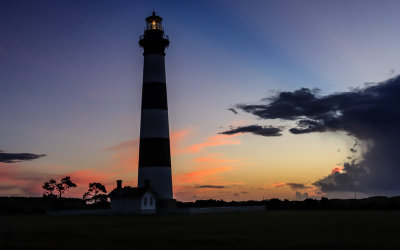 Early light behind the Bodie Island Lighthouse (built in 1872; 165 ft tall) in Cape Hatteras NS