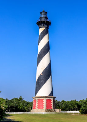 Clear morning view of the Cape Hatteras Lighthouse, world second-tallest brick lighthouse, in Cape Hatteras NS