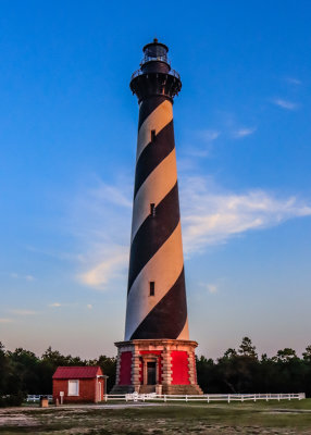 The Cape Hatteras Lighthouse glowing at sunset in Cape Hatteras NS