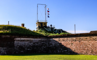 Flags fly above the World War II Command Post on top of Fort Moultrie in Fort Sumter National Monument
