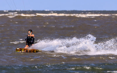 Wind surfer as viewed from the Lighthouse Inlet Heritage Preserve on Morris Island near Charleston South Carolina