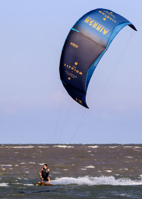 View of a wind surfer from the Lighthouse Inlet Heritage Preserve on Morris Island near Charleston South Carolina