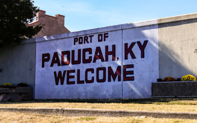 Welcome sign on the floodwall facing the river in Paducah Kentucky