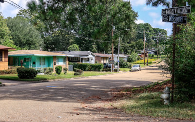 View down Margaret W. Alexander Drive at the home of Medgar Evers (left) in Medgar Evers NM 